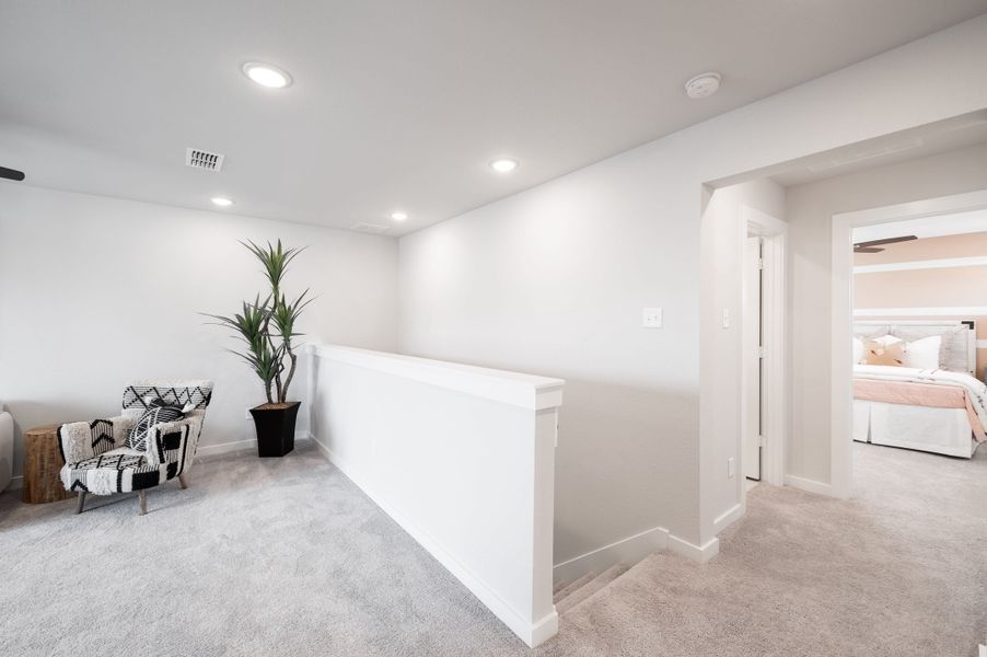 Representative furnished interior of a home built from the Yellowstar by Tri Pointe Homes in Mason Woods, Cypress (Image 15).