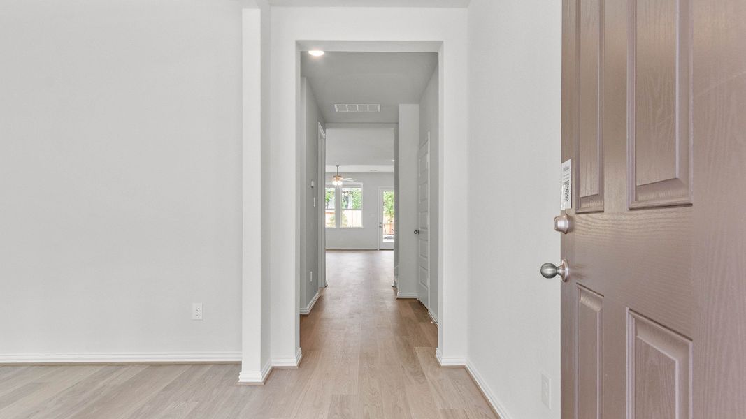 Representative furnished interior of a home built from the Capri II by Brightland Homes in Bridgeland Creekland Village, Cypress (Image 5).