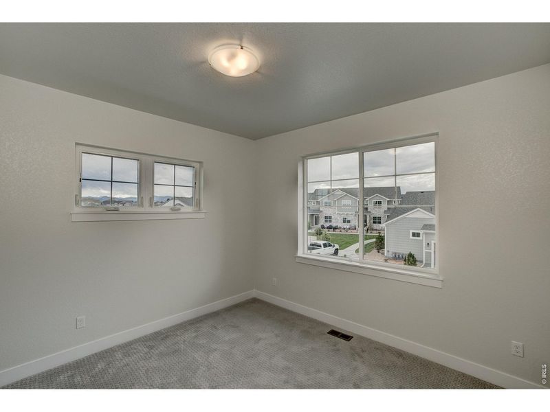 Spacious, unfurnished interior of a new home in The Lakes at Centerra - The Shores, Loveland (Image 28).
