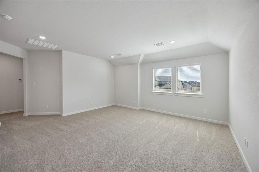 Game room in the Masters home plan by Trophy Signature Homes – REPRESENTATIVE PHOTO Game room in the Masters home plan by Trophy Signature Homes – REPRESENTATIVE PHOTO