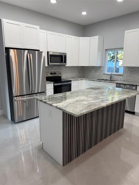 Furnished interior view inside a new home in , Kissimmee (Image 5). Furnished interior view inside a new home in , Kissimmee (Image 5).