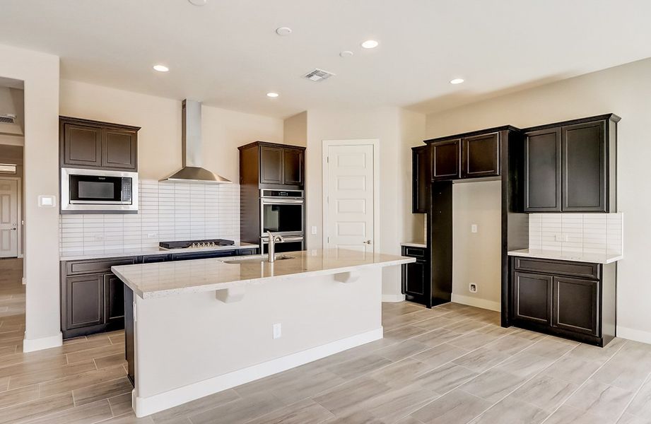 Representative furnished interior of a home built from the Hacienda Series - Topaz by Brightland Homes in Canyon Views - Hacienda, Litchfield Park (Image 4).