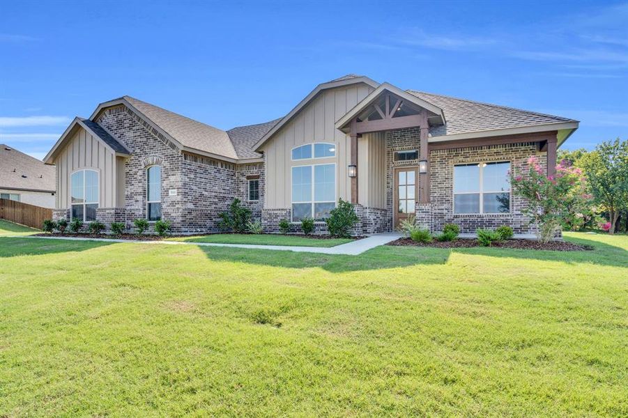 Front exterior of a new home in , Red Oak, TX, highlighting curb appeal (Image 21). Front exterior of a new home in , Red Oak, TX, highlighting curb appeal (Image 21).