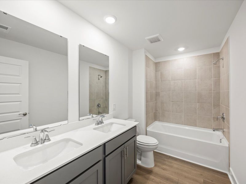 Furnished interior view inside a new home in The Coves at Lakes of Cane Bay, Summerville (Image 12). Furnished interior view inside a new home in The Coves at Lakes of Cane Bay, Summerville (Image 12).