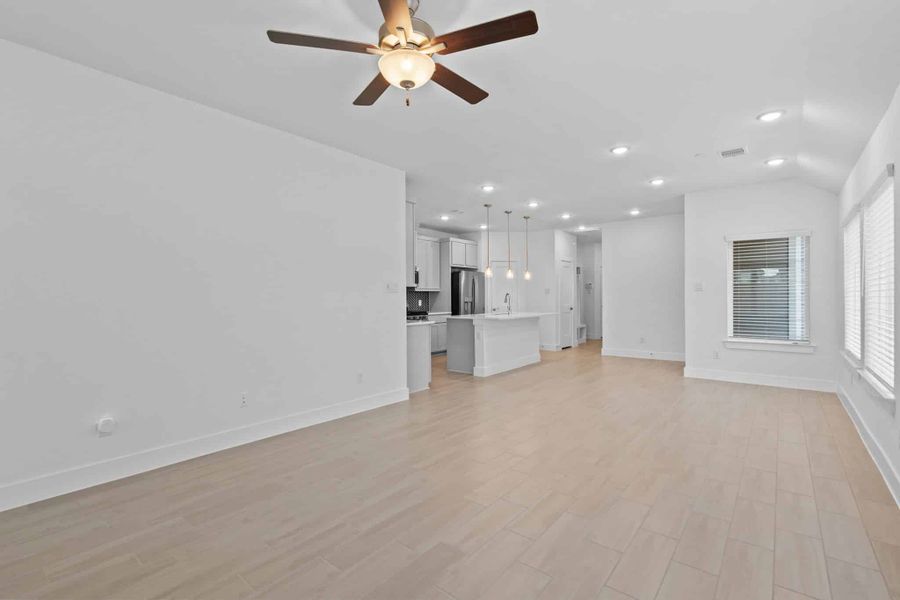Spacious, unfurnished interior of a new home in Meridiana, Iowa Colony (Image 12).
