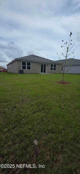 Front exterior of a new home in The Arbors, Jacksonville, FL, highlighting curb appeal (Image 27).