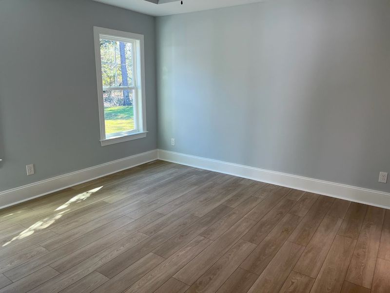 Spacious, unfurnished interior of a new home in Osprey Landing, Southport (Image 10).