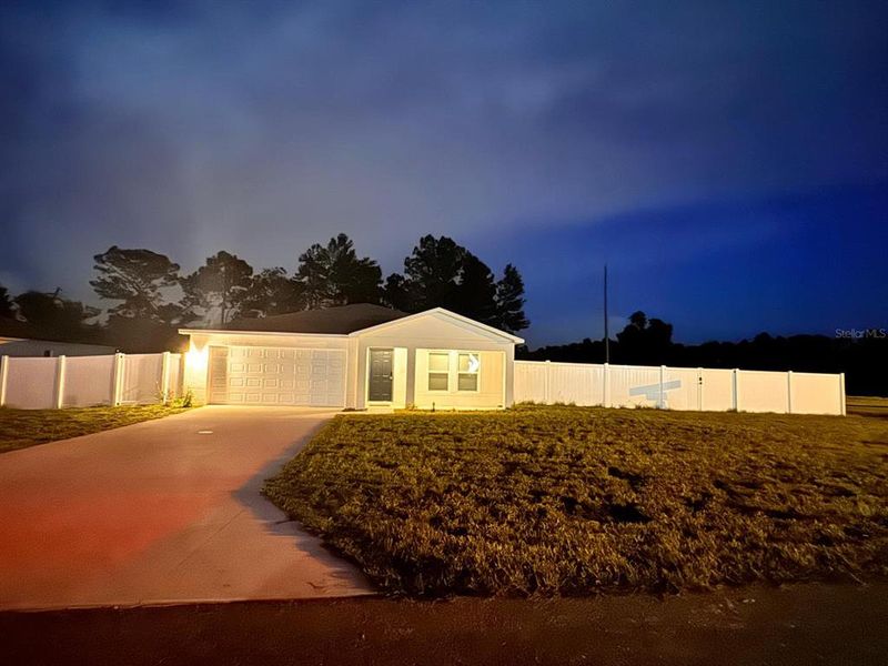 Front exterior of a new home in Marion Oaks, Ocala, FL, highlighting curb appeal (Image 22).