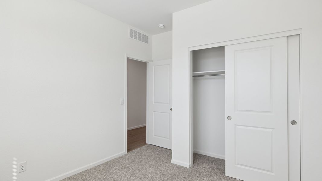 Spacious, unfurnished interior of a new home in Copper Falls, Buckeye (Image 14).