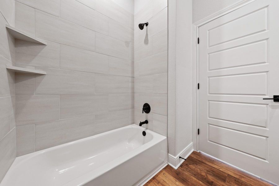 Furnished interior view inside a new home in TRACE, San Marcos (Image 9).