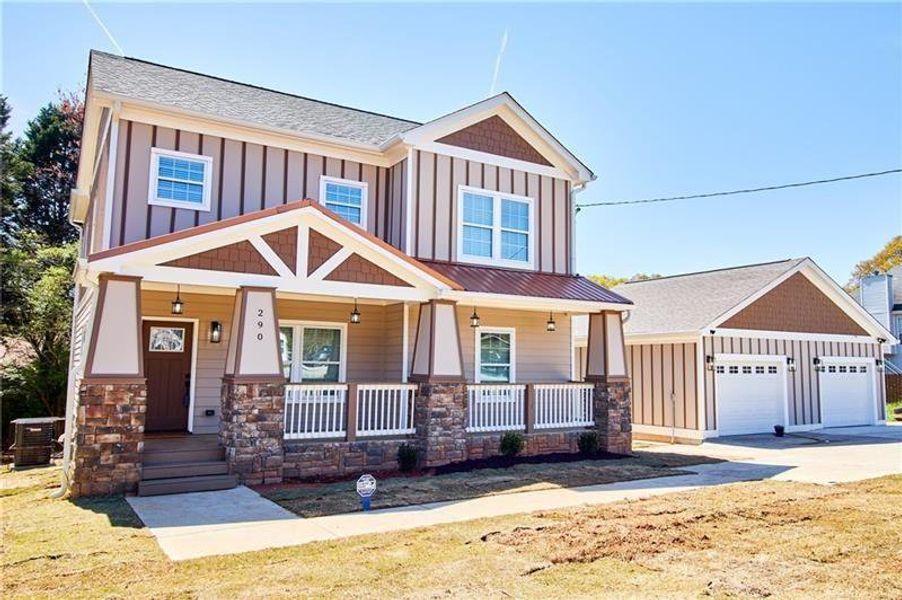 Front exterior of a new home in , Riverdale, GA, highlighting curb appeal (Image 13). Front exterior of a new home in , Riverdale, GA, highlighting curb appeal (Image 13).
