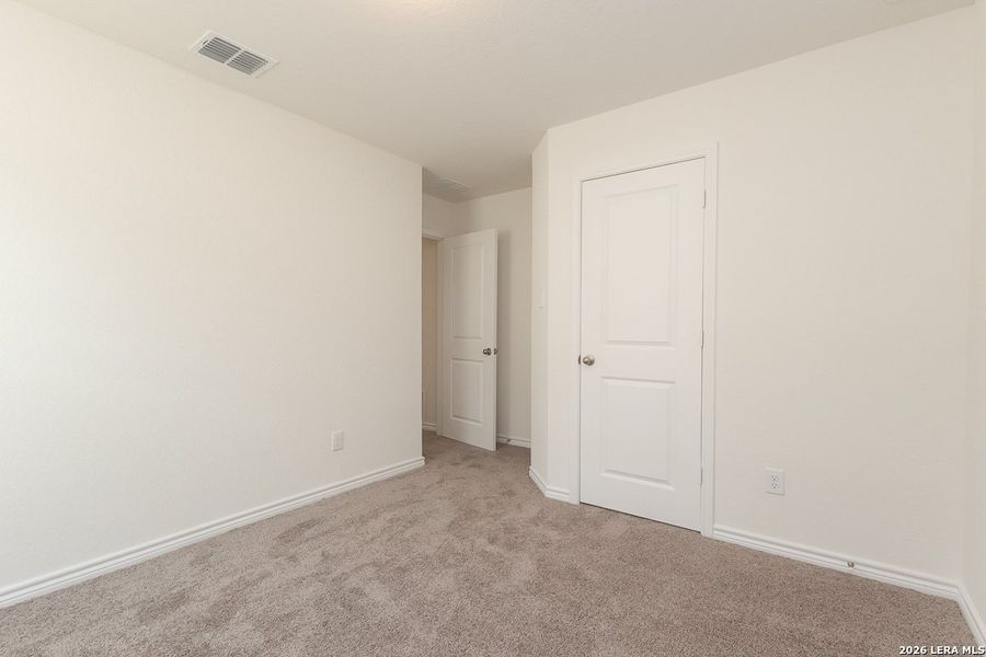 Spacious, unfurnished interior of a new home in Preserve at Culebra - Classic Collection, San Antonio (Image 20).