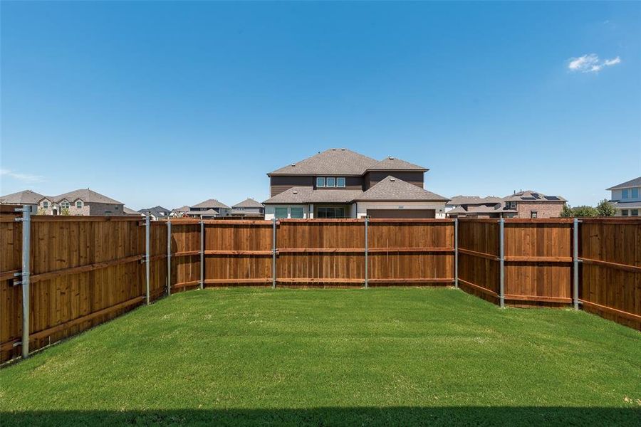 Front exterior of a new home in Villages of Creekwood, Frisco, TX, highlighting curb appeal (Image 2). Front exterior of a new home in Villages of Creekwood, Frisco, TX, highlighting curb appeal (Image 2).