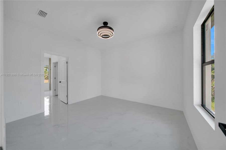 Spacious, unfurnished interior of a new home in , Lehigh Acres (Image 21). Spacious, unfurnished interior of a new home in , Lehigh Acres (Image 21).