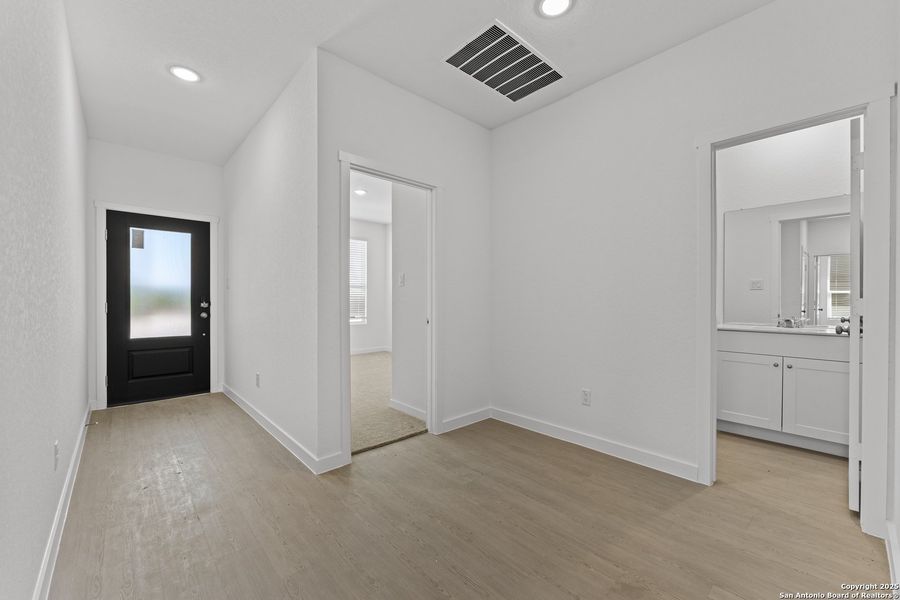 Spacious, unfurnished interior of a new home in Waterwheel: Coastline Collection, San Antonio (Image 19).