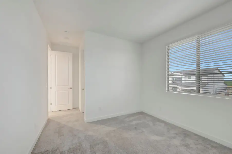 Spacious, unfurnished interior of a new home in Soleo, San Tan Valley (Image 37).