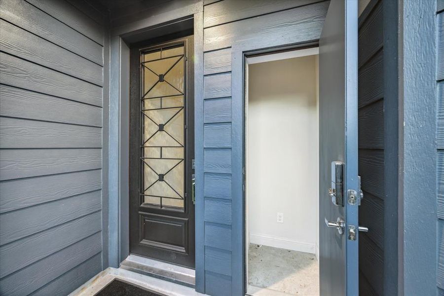 Convenient storage closet located by the front door with keypad access. Ideal for secure package deliveries such as Amazon or for stowing outdoor items.