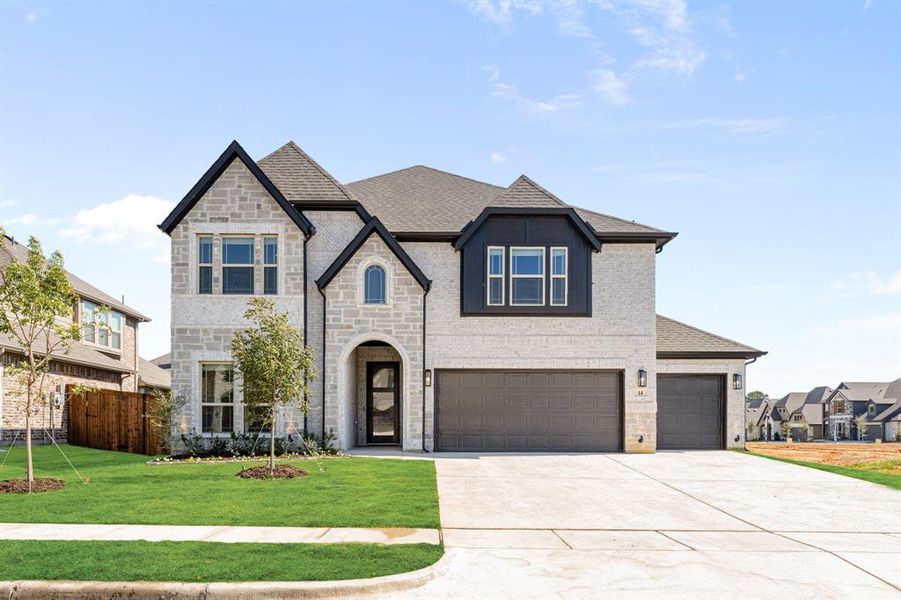 Front exterior of a new home in Mockingbird Hills 60-65, Joshua, TX, highlighting curb appeal (Image 20). Front exterior of a new home in Mockingbird Hills 60-65, Joshua, TX, highlighting curb appeal (Image 20).
