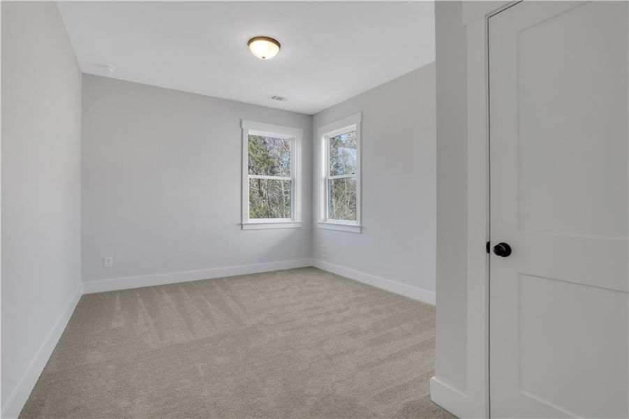 Spacious, unfurnished interior of a new home in Cambridge, Flowery Branch (Image 42).