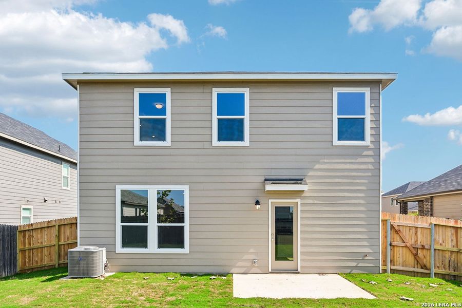 Exterior details and patio area of a home in Woodside Farms, Seguin (Image 23).