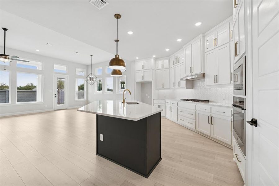 Furnished interior view inside a new home in Painted Tree - Classic Series, McKinney (Image 8). Furnished interior view inside a new home in Painted Tree - Classic Series, McKinney (Image 8).