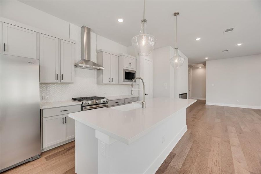 Furnished interior view inside a new home in Collin Creek, Plano (Image 5).