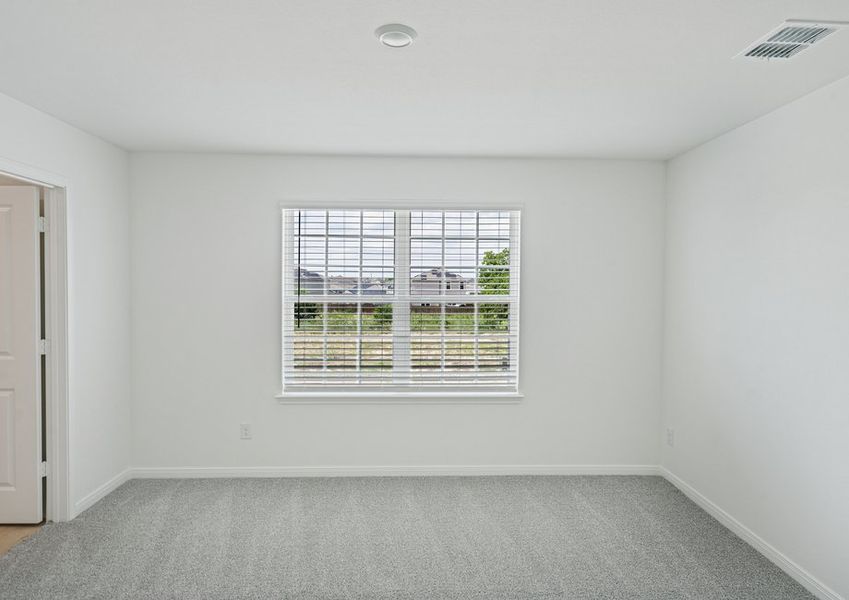 Upstairs game room with lush carpet