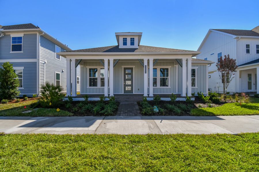 Front exterior of a new home in Seven Pines 50' Rear Entry, Jacksonville, FL, highlighting curb appeal (Image 2).