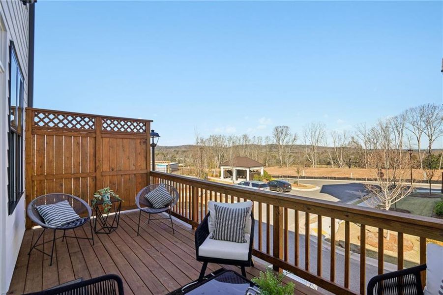 Exterior details and patio area of a home in Palisades Townhomes, Cumming (Image 2). Exterior details and patio area of a home in Palisades Townhomes, Cumming (Image 2).