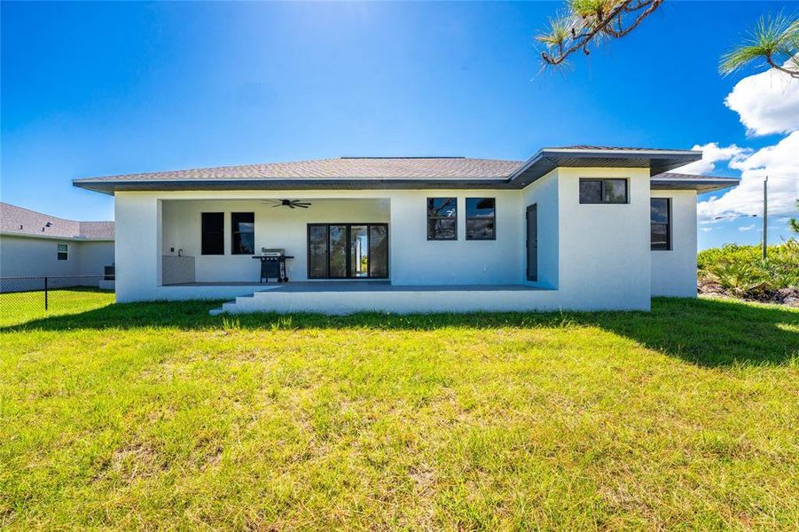 Exterior details and patio area of a home in , Port Charlotte (Image 34).