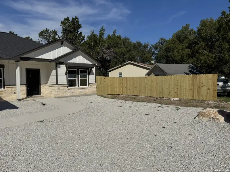 Exterior details and patio area of a home in , Spring Branch (Image 22).