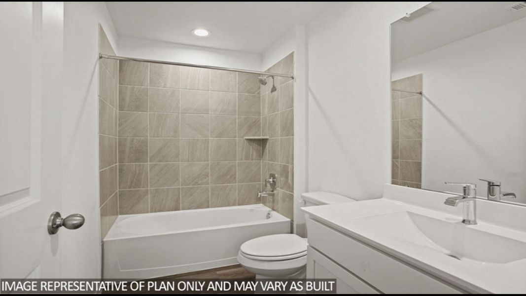Representative furnished interior of a home built from the Midland by D.R. Horton in Sunterra, Katy (Image 11).