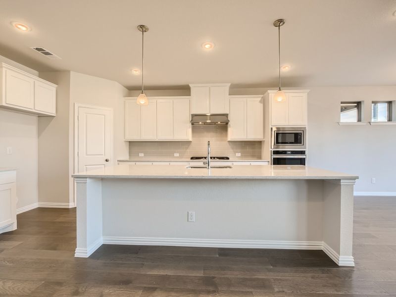 Plan 1533 Kitchen Representative Photo by American Legend Homes