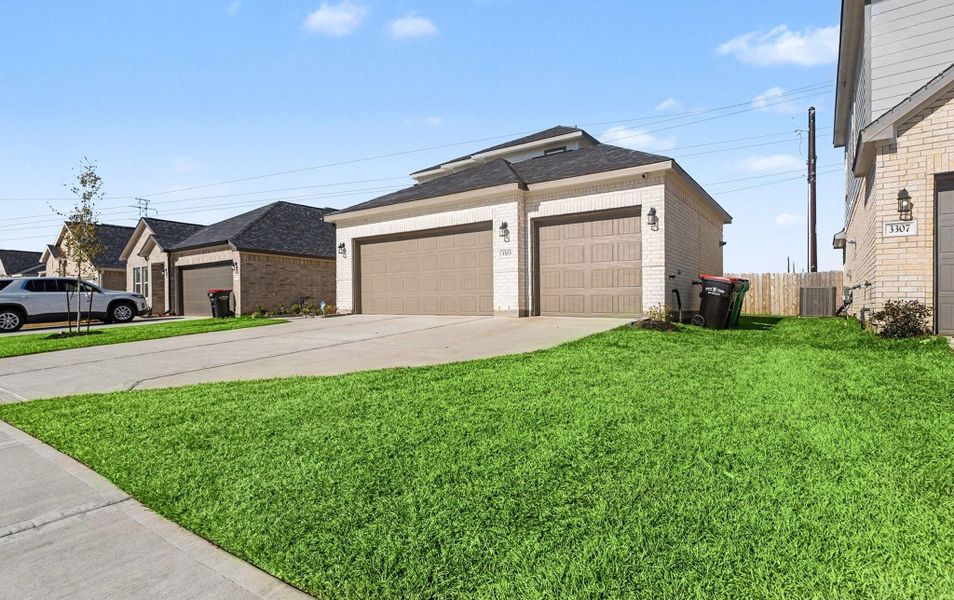 Front exterior of a new home in , Baytown, TX, highlighting curb appeal (Image 23).