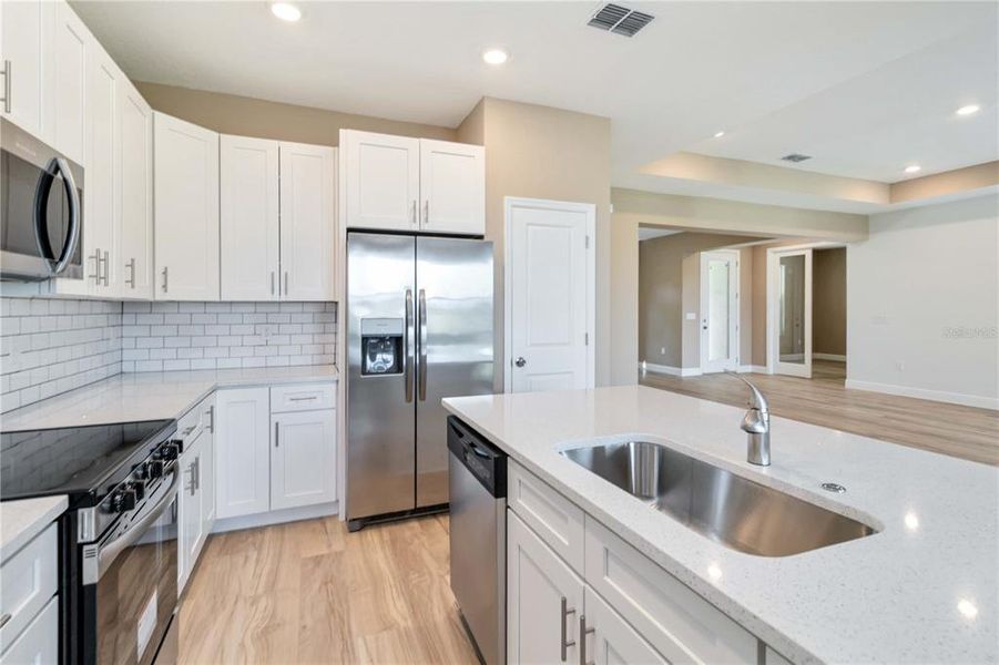Furnished interior view inside a new home in , Clermont (Image 11).