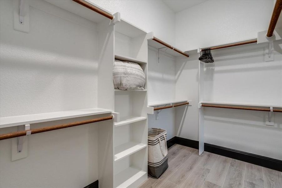 Walk in closet featuring tiled floors