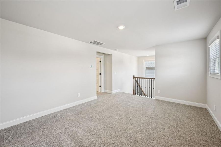 Spacious, unfurnished interior of a new home in Vines at Mill Creek - Legacy Series, Braselton (Image 32).