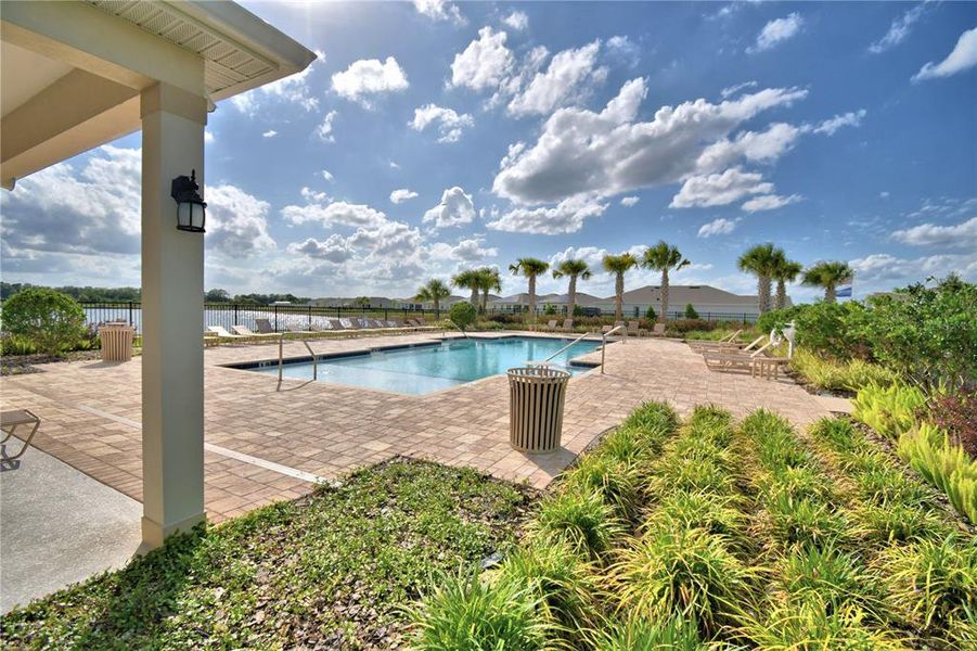 Exterior details and patio area of a home in Harmony at Lake Eloise, Winter Haven (Image 34).