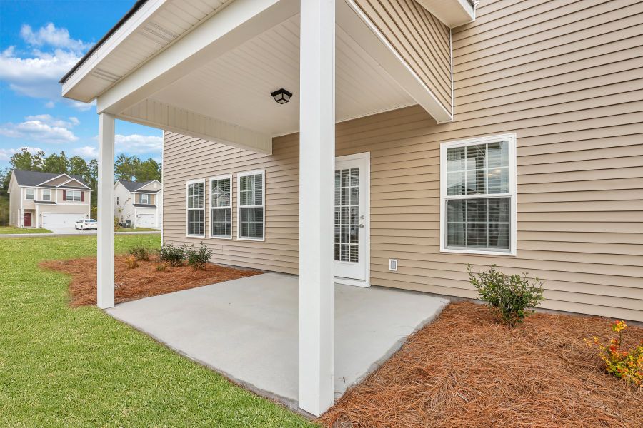 Representative exterior photo of a completed home built from the The Denmark by RTS Homes in Tibet Road at Sassafras, Allenhurst, GA (Image 30).