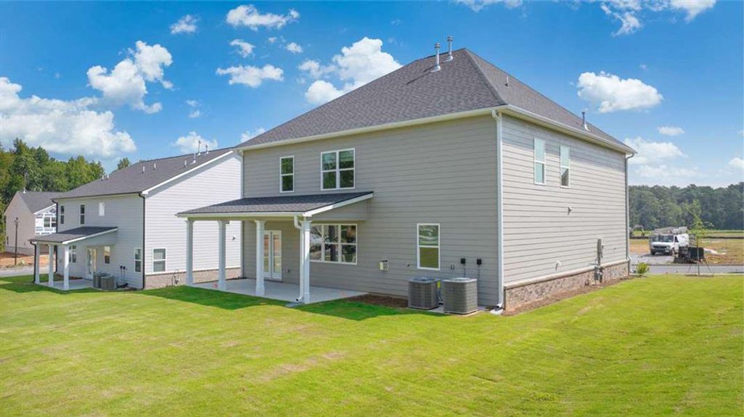 Exterior details and patio area of a home in Independence, Loganville (Image 19).