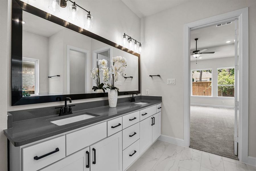 EXAMPLE PHOTO: Large master bath with dual sinks and quartz counters