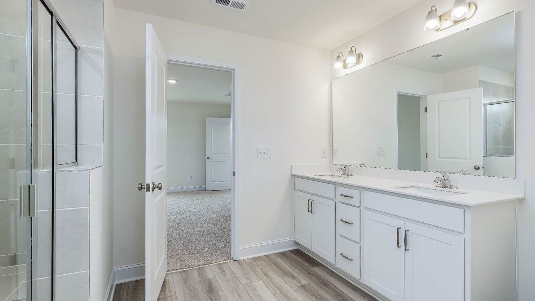 Furnished interior view inside a new home in Sidney Creek Single Family, Zebulon (Image 13).