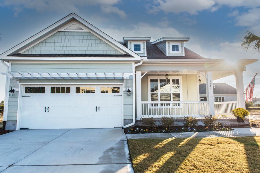 Representative exterior photo of a completed home built from the McKenzie by Bill Clark Homes in Osprey Landing, Southport, NC (Image 9).