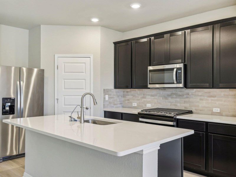 Photo is not of the actual home, but is an inspirational photo of builder’s model home and may depict options, furnishings, and/or decorator features that are not included