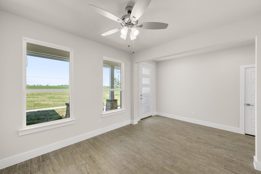 Front exterior of a new home in Carrera Ranch, Waxahachie, TX, highlighting curb appeal (Image 16).