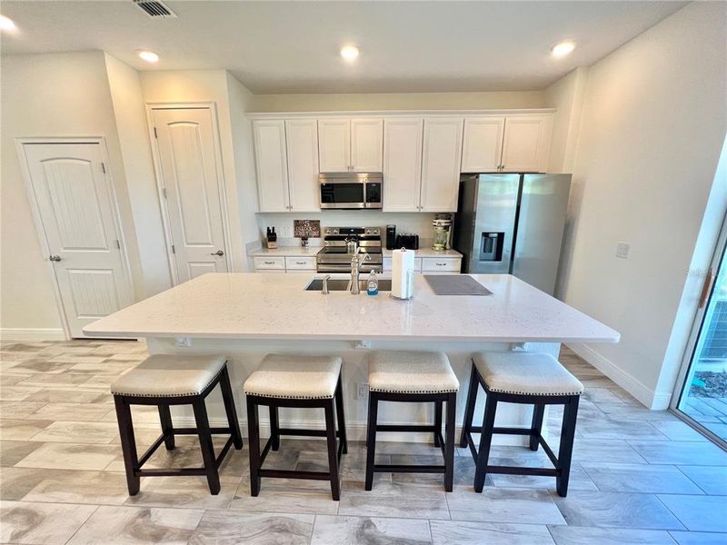 Furnished interior view inside a new home in , Kissimmee (Image 34).