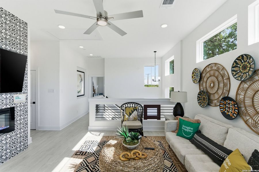 Furnished interior view inside a new home in Centero at Stone Oak, San Antonio (Image 25).
