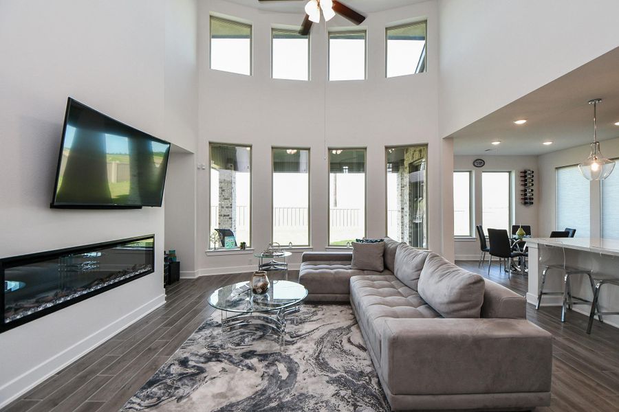 There's no doubt about it. It's your living/family oasis, but it is also a cathedral-like showplace, like no other! Walls of windows, up and down, bring welcomed natural light into this sleek space,which shares room with your chef's kitchen, right. There's no doubt about it. It's your living/family oasis, but it is also a cathedral-like showplace, like no other! Walls of windows, up and down, bring welcomed natural light into this sleek space,which shares room with your chef's kitchen, right.