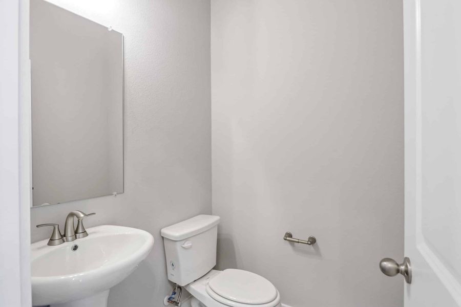 Representative furnished interior of a home built from the The Teton by Lillian Custom Homes in Polo Ridge, Heath (Image 18).