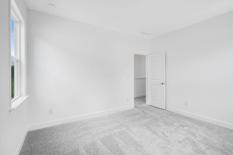 Spacious, unfurnished interior of a new home in Bennett Farm, Loganville (Image 24).